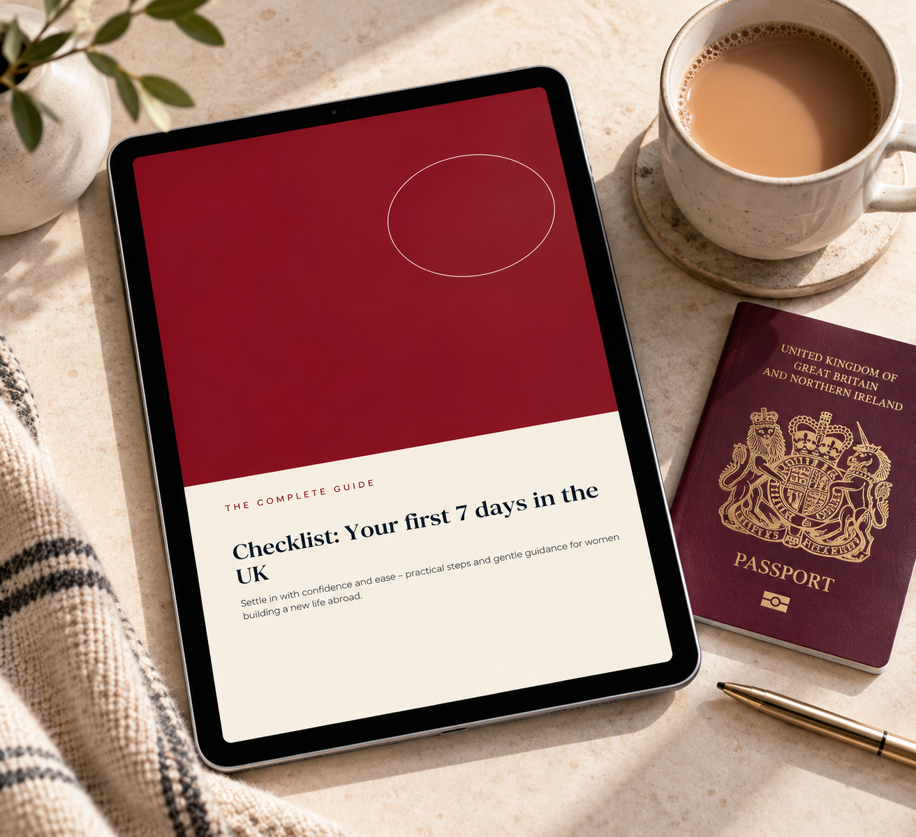 The First 7 Days in the UK checklist displayed on an iPad lying on a beige tabletop beside a cup of tea, a UK passport and a gold pen